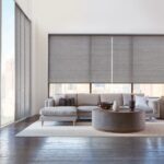 Designer Roller Shades and Skyline® Gliding Window Panels in Maya with PowerView® Automation in a living room