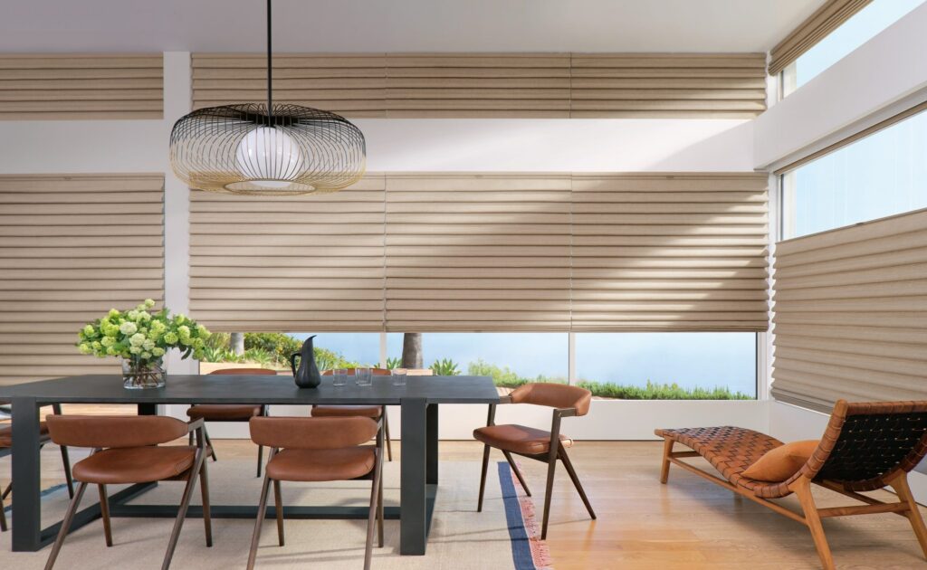 Hunter Douglas Vignette Modern Roman Shades with top-down/bottom-up design in a dining room